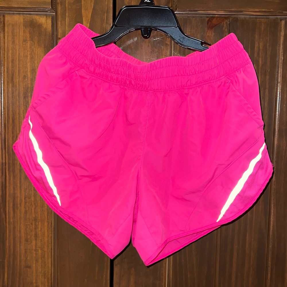 Bright pink wind shorts